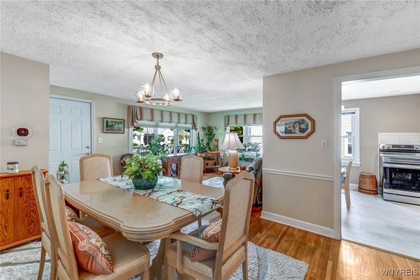 Dining room, Fireplace, Interior, Pendant Lights, Wood Texture Flooring