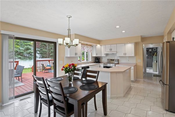 Chandelier, Dining room, Interior, Kitchen, Pendant Lights, Recessed Lighting, Stainless Steel Appliances
