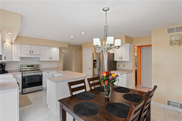 Dining room, Interior, Kitchen, Marble, Pendant Lights, Recessed Lighting, Stainless Steel Appliances
