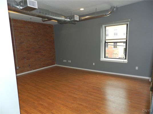 Empty room, Interior, Recessed Lighting, Stone Walls, Wood Texture Flooring