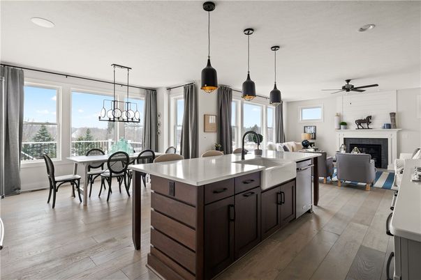 Dining room, Fireplace, Interior, Kitchen, Pendant Lights, Recessed Lighting, Wood Texture Flooring
