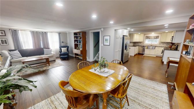 Dining room, Interior, Kitchen, Living room, Recessed Lighting, Stainless Steel Appliances, Wood Texture Flooring