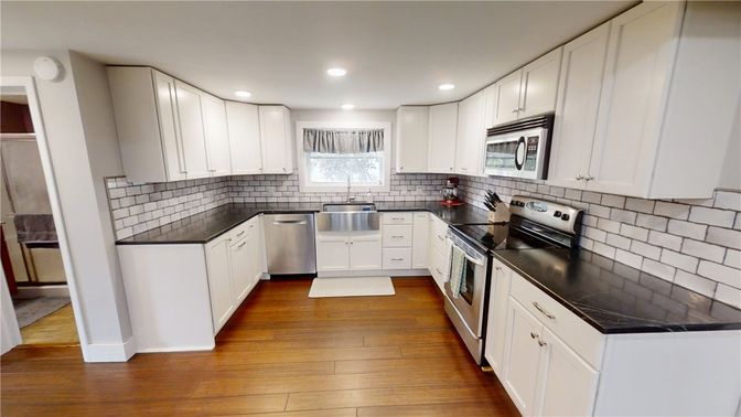 Interior, Kitchen, Recessed Lighting, Stainless Steel Appliances, Wood Texture Flooring