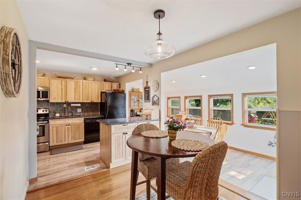 Dining room, Interior, Kitchen, Pendant Lights, Recessed Lighting, Stainless Steel Appliances, Wood Texture Flooring