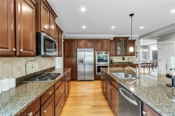 Dining room, Interior, Kitchen, Pendant Lights, Recessed Lighting, Stainless Steel Appliances, Wood Texture Flooring