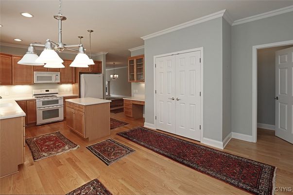 Chandelier, Interior, Kitchen, Pendant Lights, Recessed Lighting, Stainless Steel Appliances, Wood Texture Flooring