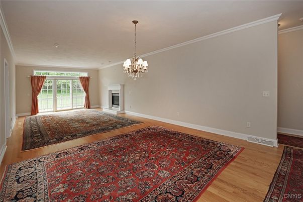 Chandelier, Empty room, Fireplace, Interior, Wood Texture Flooring