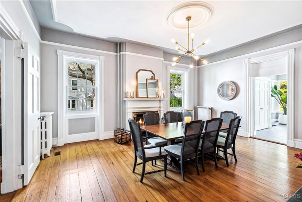 Dining room, Fireplace, Interior, Pendant Lights, Wood Texture Flooring
