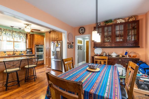 Dining room, Interior, Kitchen, Pendant Lights, Stainless Steel Appliances, Wood Texture Flooring