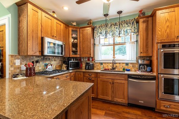 Chandelier, Interior, Kitchen, Recessed Lighting, Stainless Steel Appliances, Wood Texture Flooring