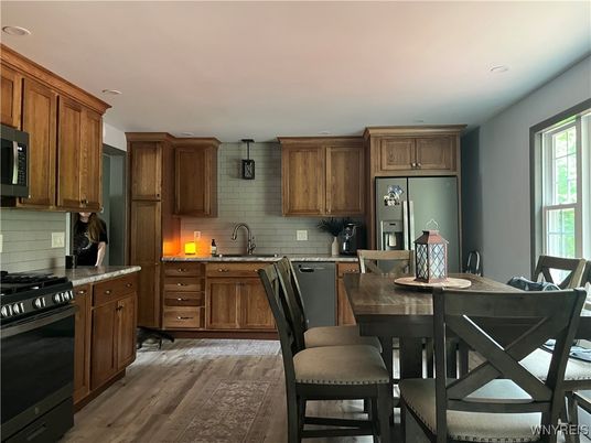 Dining room, Interior, Kitchen, Recessed Lighting, Stainless Steel Appliances, Wood Texture Flooring