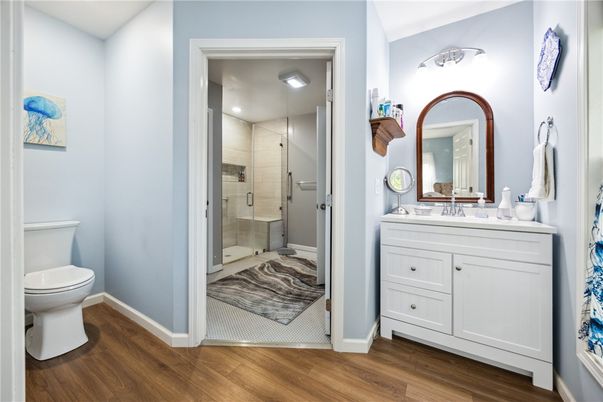 Bathroom, Glass Shower, Interior, Recessed Lighting, Wood Texture Flooring