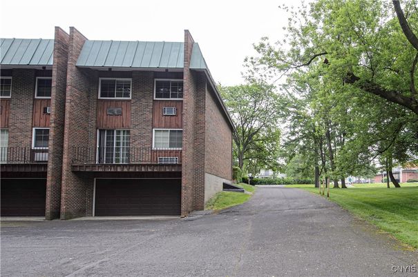 Attached, Exterior, Facade, Brick Facade, Condo Building