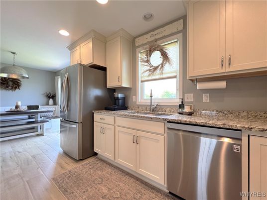 Dining room, Interior, Kitchen, Recessed Lighting, Stainless Steel Appliances, Wood Texture Flooring