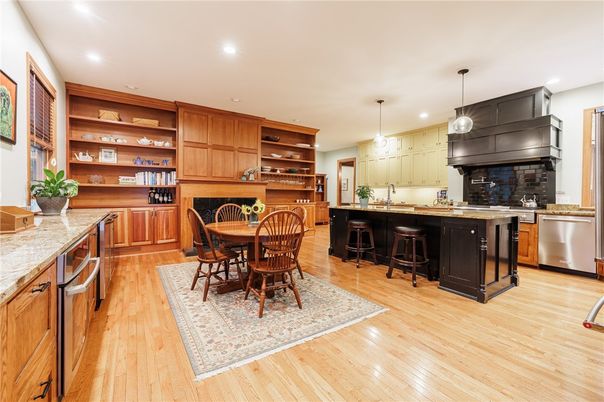 Dining room, Interior, Kitchen, Pendant Lights, Recessed Lighting, Stainless Steel Appliances, Wood Texture Flooring