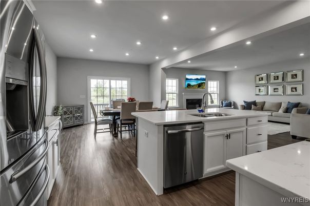 Dining room, Fireplace, Interior, Kitchen, Living room, Recessed Lighting, Stainless Steel Appliances, Wood Texture Flooring