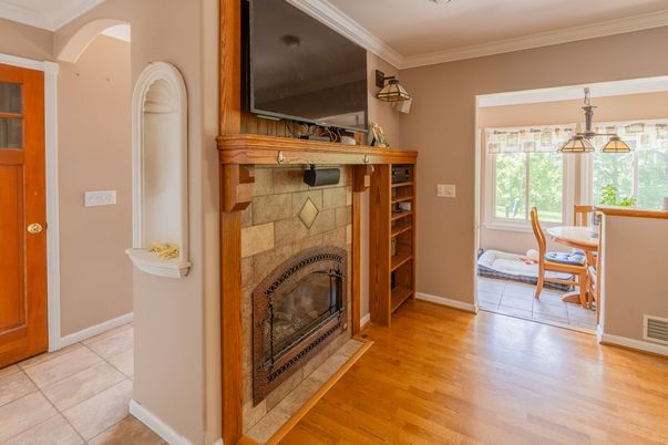 Dining room, Fireplace, Interior, Pendant Lights, Wood Texture Flooring