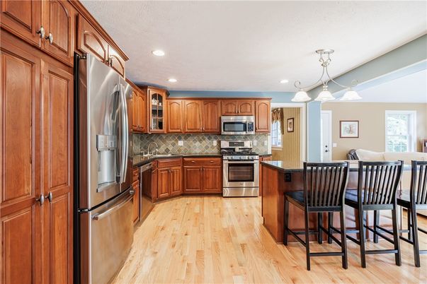 Interior, Kitchen, Pendant Lights, Recessed Lighting, Stainless Steel Appliances, Wood Texture Flooring