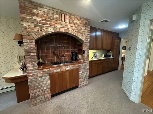 Fireplace, Interior, Kitchen, Recessed Lighting, Stone Walls