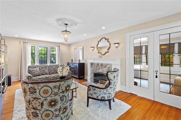 Chandelier, Fireplace, Interior, Living room, Recessed Lighting, Wood Texture Flooring