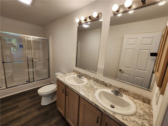 Bathroom, Dual Sink Vanities, Glass Shower, Interior, Wood Texture Flooring