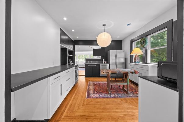 Interior, Kitchen, Pendant Lights, Recessed Lighting, Stainless Steel Appliances, Wood Texture Flooring