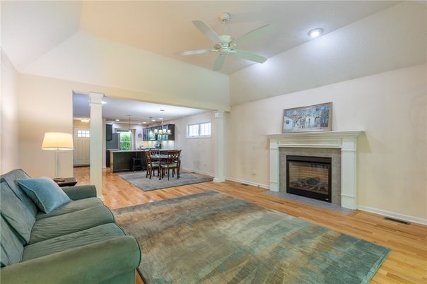 Dining room, Fireplace, Interior, Living room, Pendant Lights, Recessed Lighting, Wood Texture Flooring