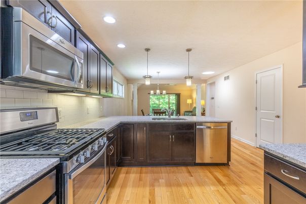 Interior, Kitchen, Pendant Lights, Recessed Lighting, Stainless Steel Appliances, Wood Texture Flooring