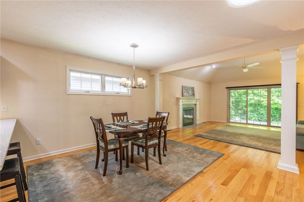 Chandelier, Dining room, Fireplace, Interior, Recessed Lighting, Wood Texture Flooring
