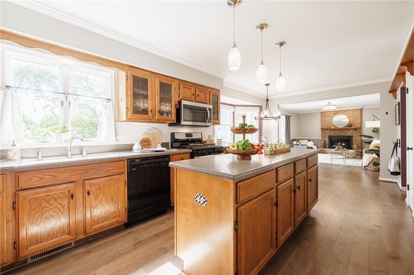 Fireplace, Interior, Kitchen, Pendant Lights, Stainless Steel Appliances, Wood Texture Flooring