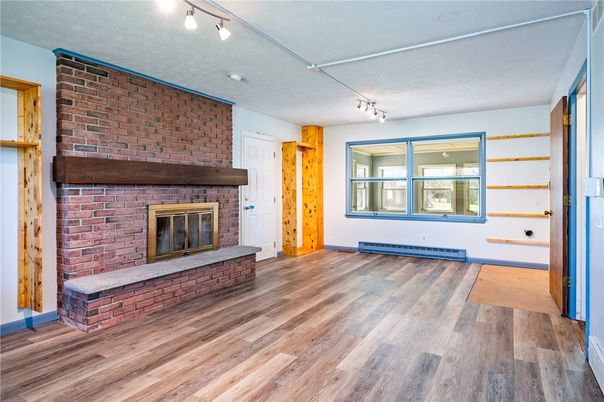 Empty room, Fireplace, Interior, Stone Walls, Wood Texture Flooring