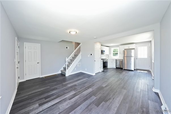 Empty room, Interior, Kitchen, Stainless Steel Appliances, Wood Texture Flooring