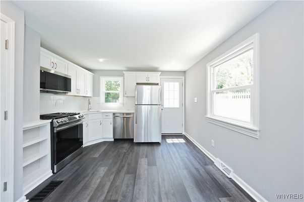 Interior, Kitchen, Recessed Lighting, Stainless Steel Appliances, Wood Texture Flooring
