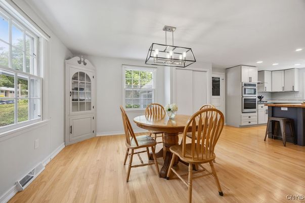 Dining room, Interior, Kitchen, Pendant Lights, Recessed Lighting, Stainless Steel Appliances, Wood Texture Flooring