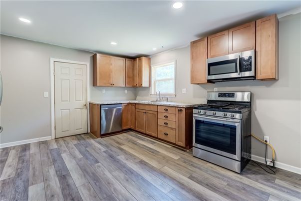 Interior, Kitchen, Recessed Lighting, Stainless Steel Appliances, Wood Texture Flooring