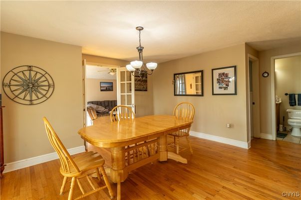 Chandelier, Dining room, Interior, Wood Texture Flooring