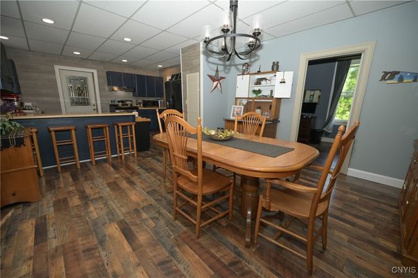 Chandelier, Dining room, Interior, Kitchen, Recessed Lighting, Stainless Steel Appliances, Wood Texture Flooring
