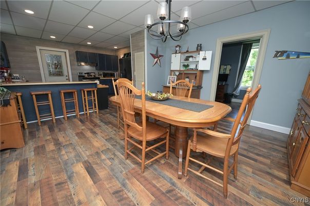 Chandelier, Dining room, Interior, Kitchen, Recessed Lighting, Stainless Steel Appliances, Wood Texture Flooring