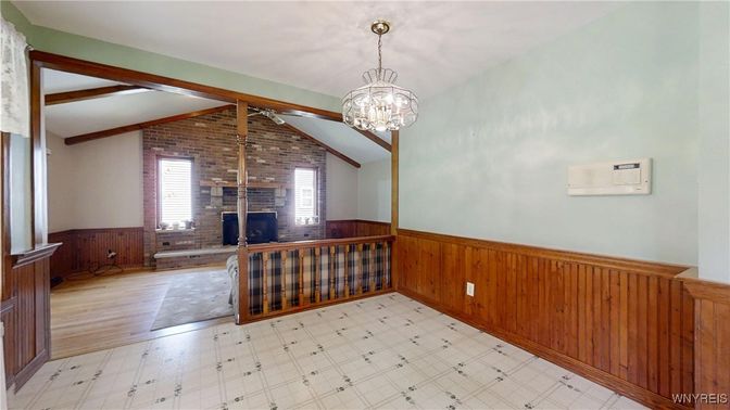 Chandelier, Empty room, Fireplace, Interior, Stone Walls, Wood Texture Flooring