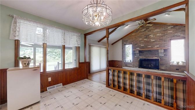 Chandelier, Empty room, Fireplace, Interior, Stone Walls, Wooden Beams, Wood Texture Flooring