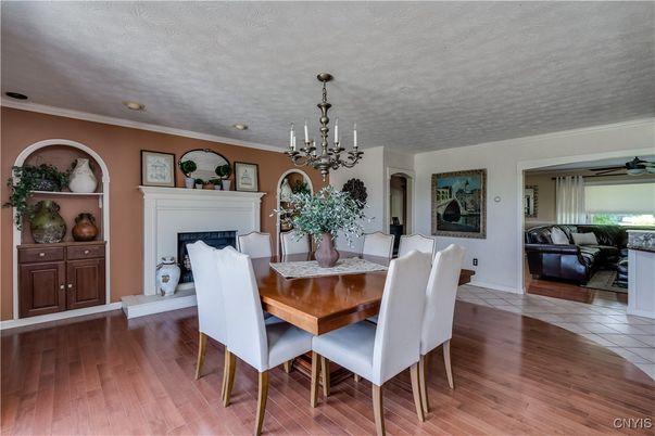 Chandelier, Dining room, Fireplace, Interior, Wood Texture Flooring