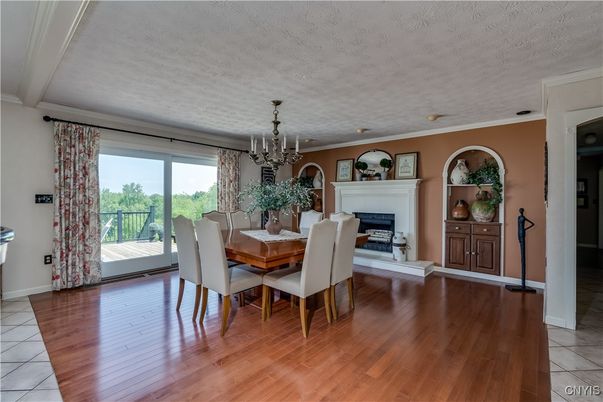 Chandelier, Dining room, Fireplace, Interior, Wood Texture Flooring
