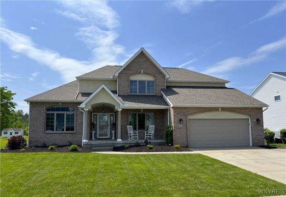 Attached, Exterior, Facade, Brick Facade, Brick Traditional