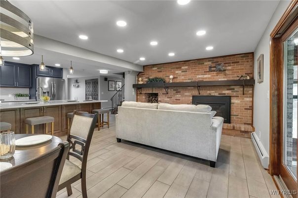 Fireplace, Interior, Kitchen, Living room, Pendant Lights, Recessed Lighting, Stone Walls, Wood Texture Flooring