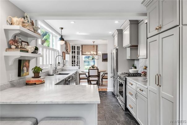 Chandelier, Dining room, Interior, Kitchen, Pendant Lights, Recessed Lighting, Stainless Steel Appliances
