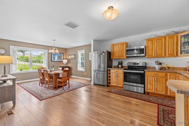 Dining room, Interior, Kitchen, Pendant Lights, Stainless Steel Appliances, Wood Texture Flooring