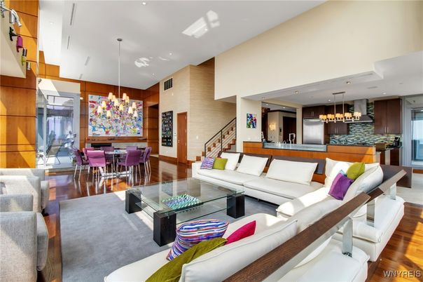 Chandelier, Dining room, Interior, Kitchen, Living room, Pendant Lights, Recessed Lighting, Stainless Steel Appliances, Wood Texture Flooring