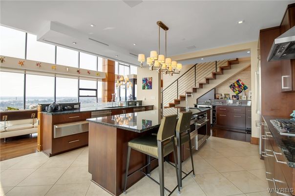 Chandelier, Dining room, Interior, Kitchen, Recessed Lighting, Stainless Steel Appliances, Wood Texture Flooring