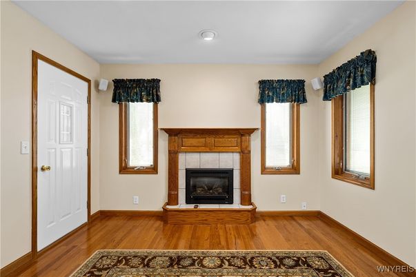 Empty room, Fireplace, Interior, Recessed Lighting, Wood Texture Flooring
