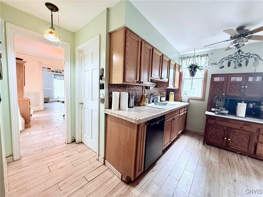 Chandelier, Interior, Kitchen, Pendant Lights, Tile Countertops, Wood Texture Flooring